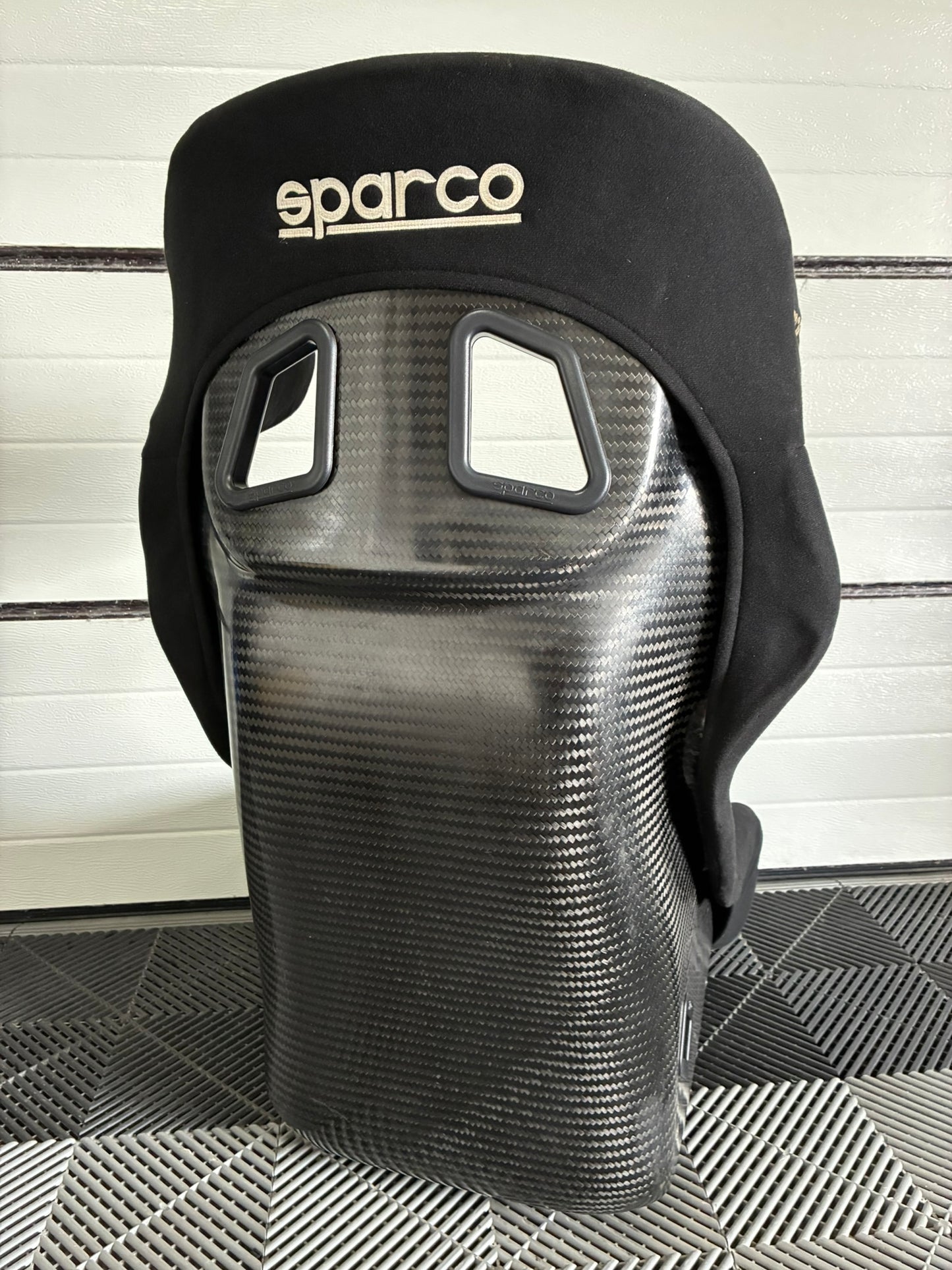 Used. Sparco S-Light Circuit Carbon racing seat.