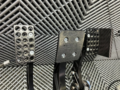 Used. AP racing Pedal Box Complete with Master Cylinders. Carbon fiber.