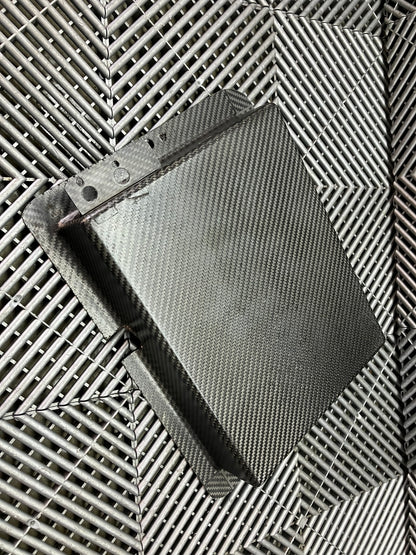 Used. Carbon fiber cover. 35x27 cm