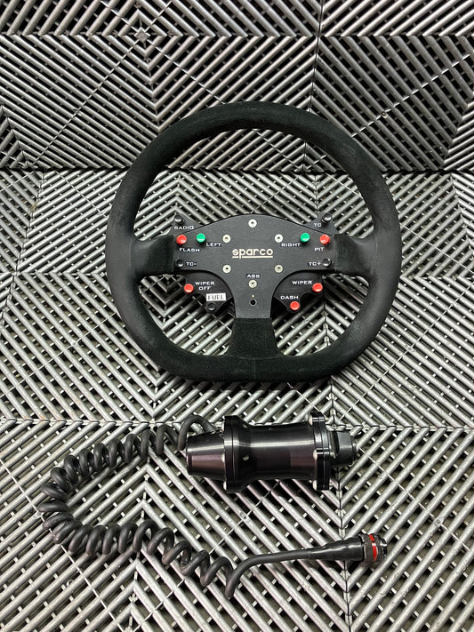 Used. Sparco steering wheel with adapter + wiring + buttons