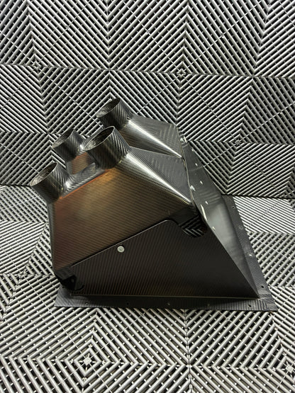 Used. BMW E92 Carbon fiber rear diff and brake cooling vents box.