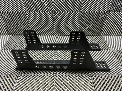 Used. Universal race seat side mounts.