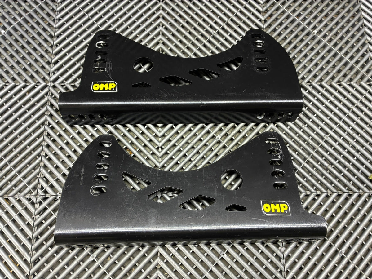 Used. OMP universal race seat side mounts