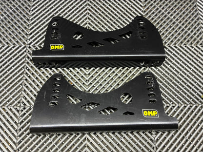 Used. OMP universal race seat side mounts