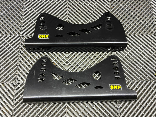 Used. OMP universal race seat side mounts