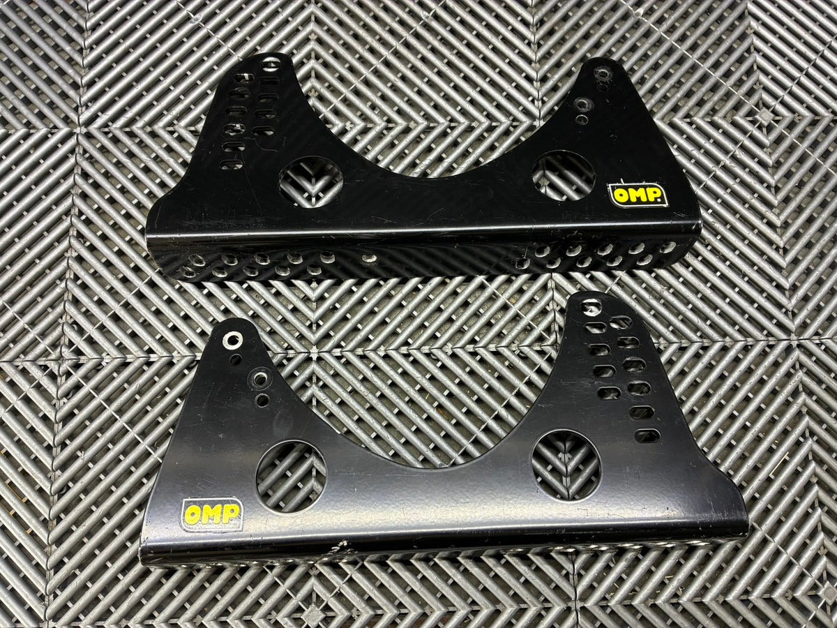 Used. OMP universal race seat side mounts