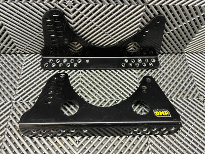 Used. OMP universal race seat side mounts