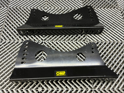 Used. OMP universal race seat side mounts