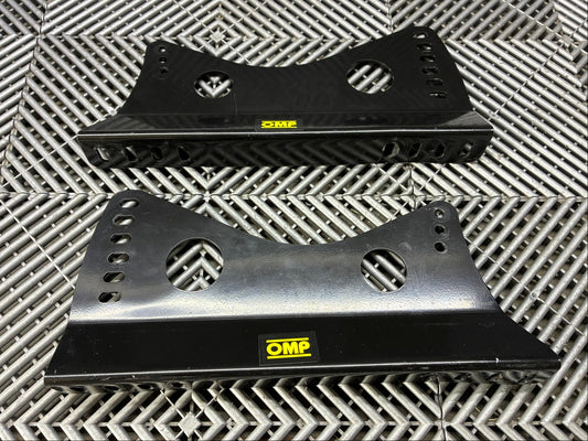 Used. OMP universal race seat side mounts