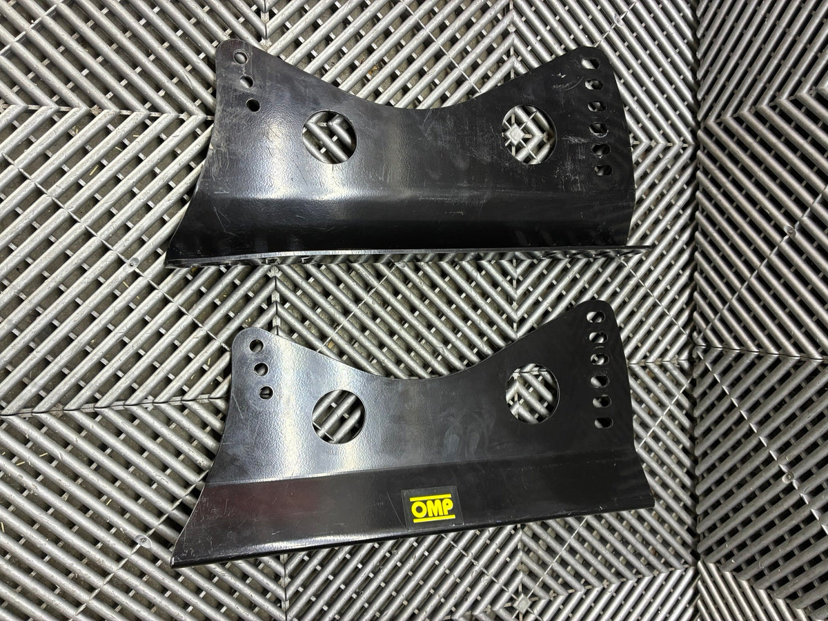 Used. OMP universal race seat side mounts