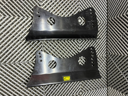 Used. OMP universal race seat side mounts