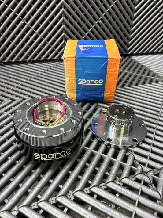 New. Sparco steering wheel quick release adapter kit.