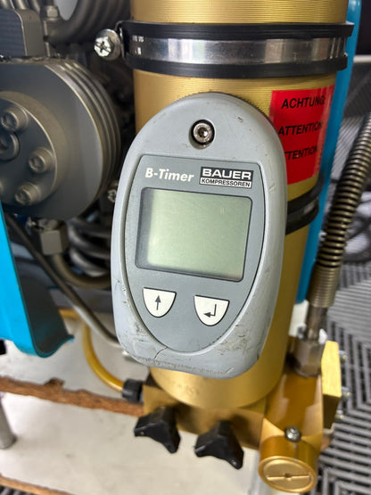 Used. Bauer Junior II high-pressure air compressor.