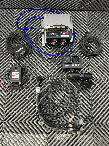 Used. AiM EVO5 motorsport telemetry and video logging kit.