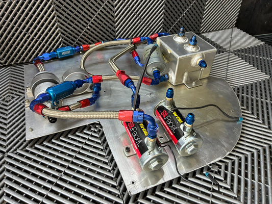 Used. Fuel surge tank and pump assembly mounted on an aluminum baseplate.