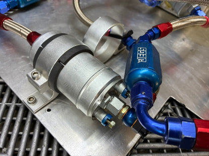 Used. Fuel surge tank and pump assembly mounted on an aluminum baseplate.
