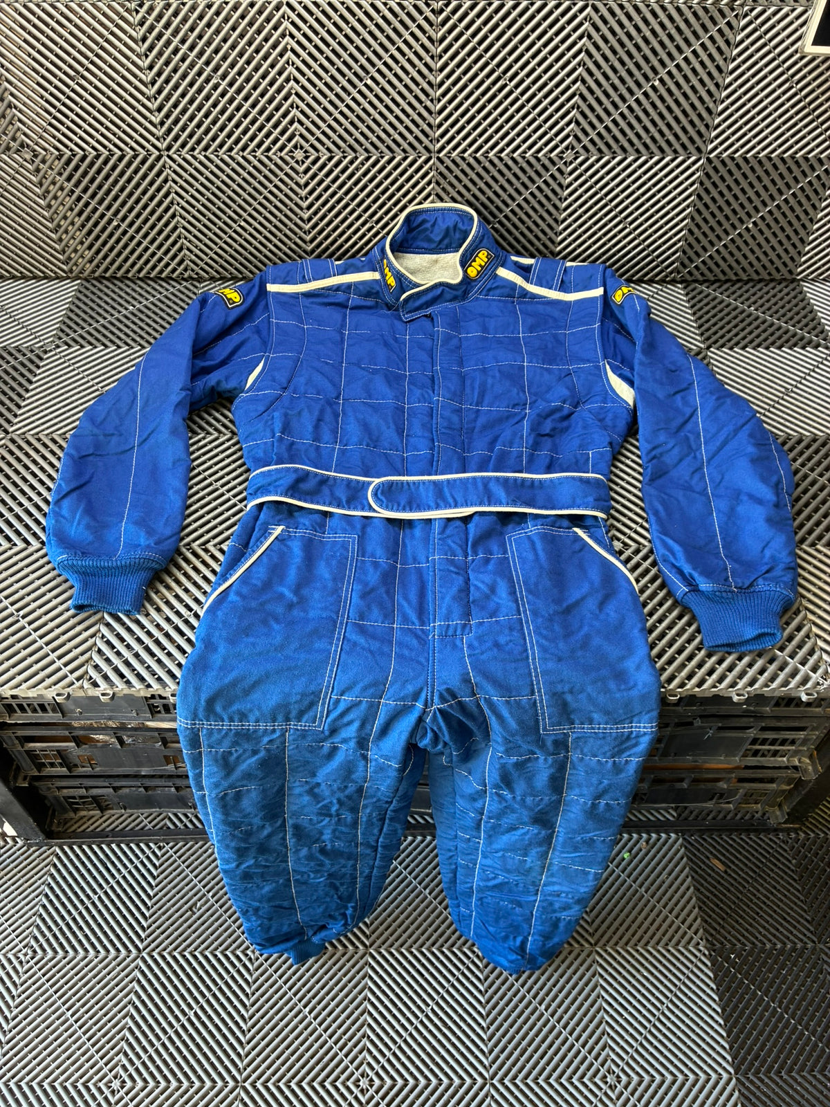 Used. OMP racing suits.