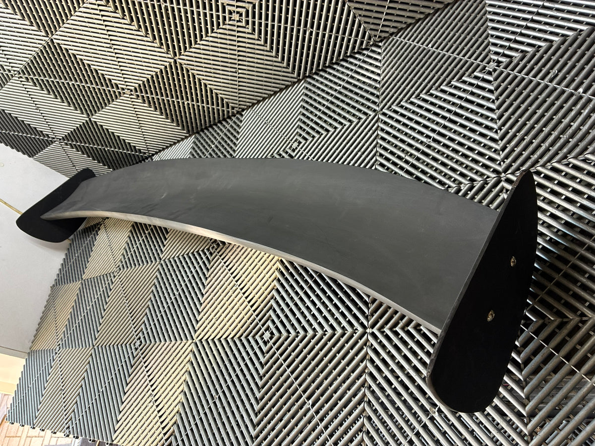 New. Rear fiberglass spoiler 140x23 cm  + brackets.