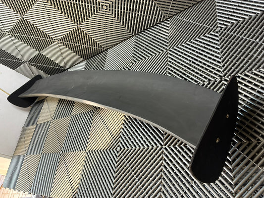 New. Rear fiberglass spoiler 140x23 cm  + brackets.