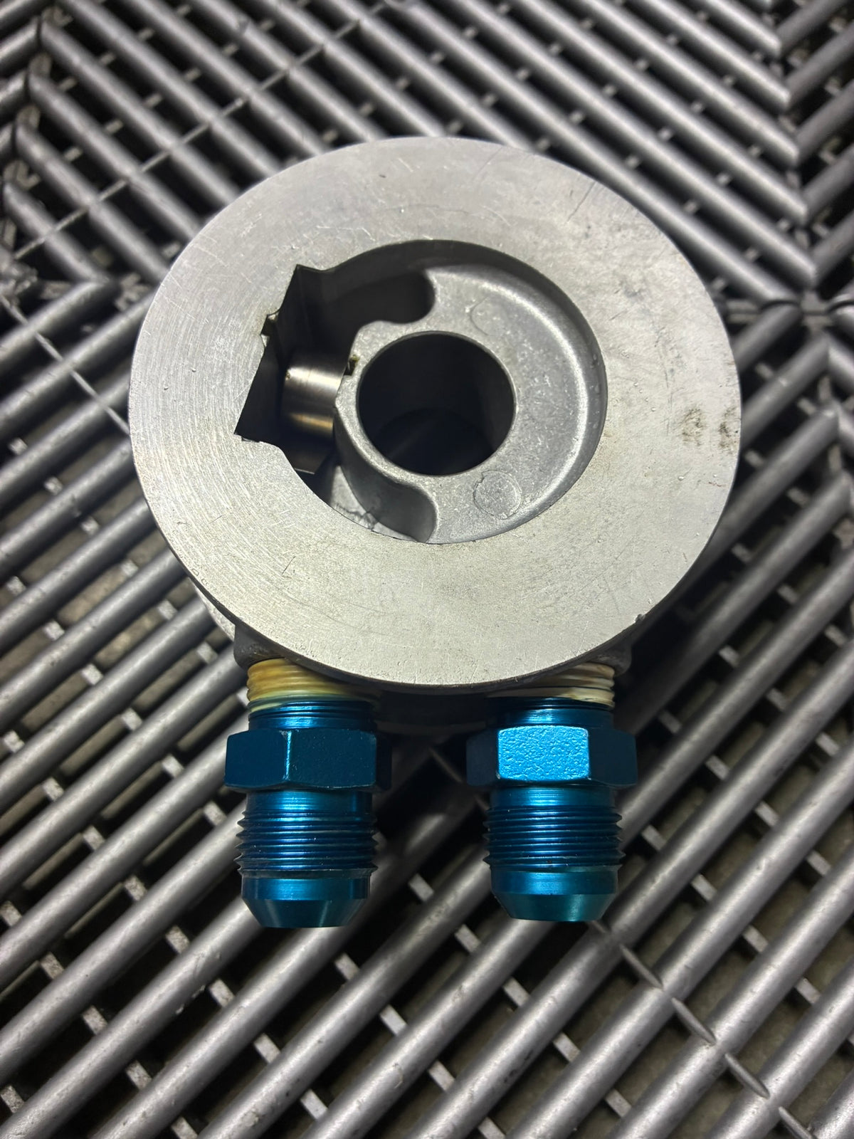 Used. Oil filter sandwich plate adapter
