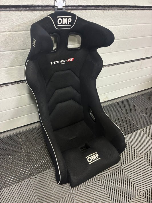 Used. OMP HTE-R 400 Fiberglass Racing seat.