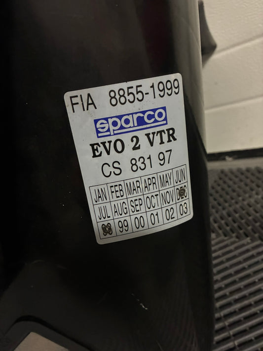 Used. Sparco EVO2 seat.