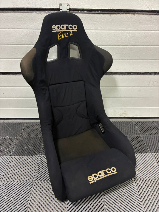 Used. Sparco EVO2 seat.