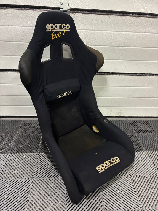 Used. Sparco EVO2 seat.